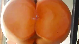 Mistress Stormy  busty babe masturbates shaved cunt